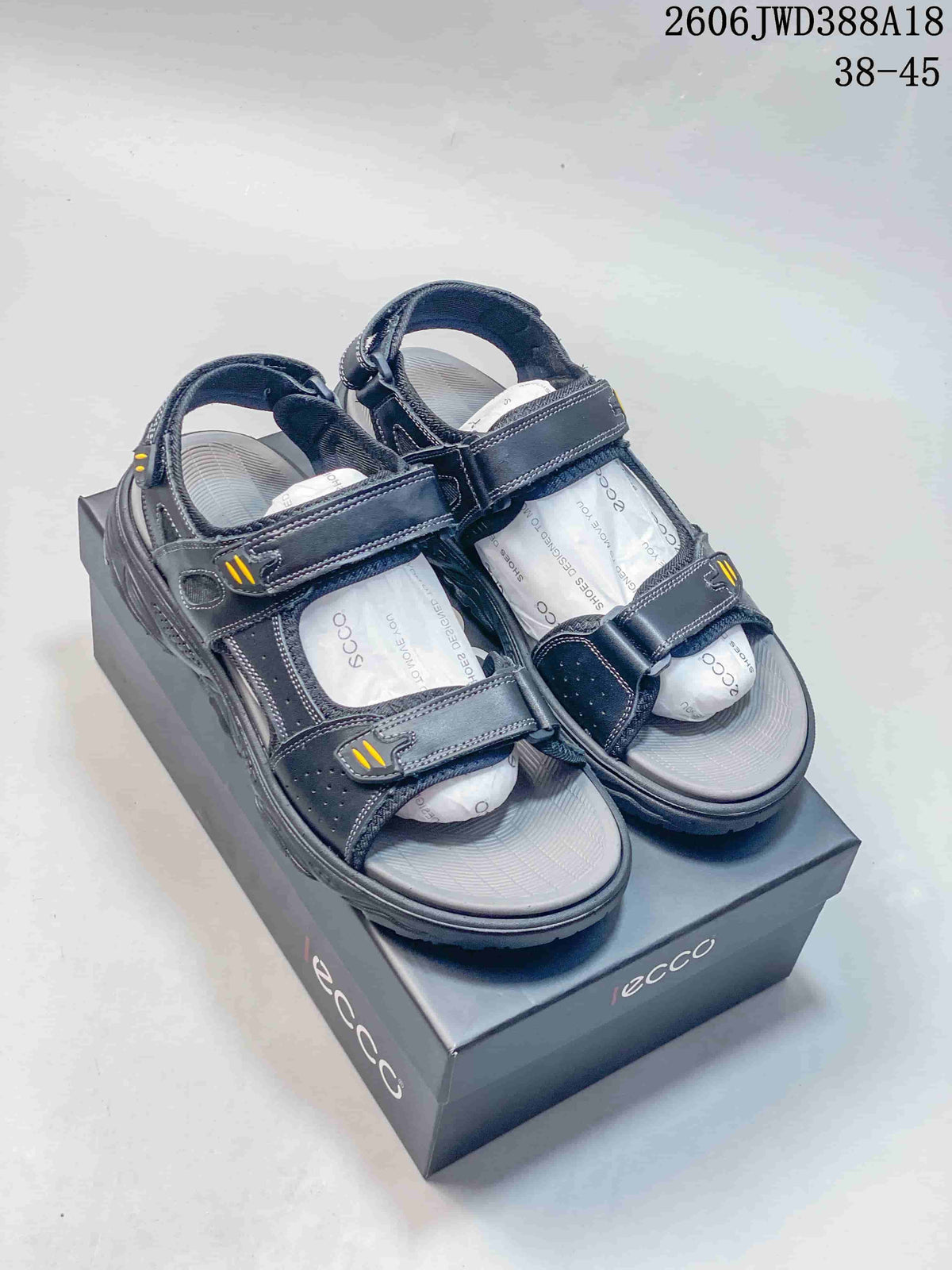 Pair of gray sandals with adjustable straps shown from above.