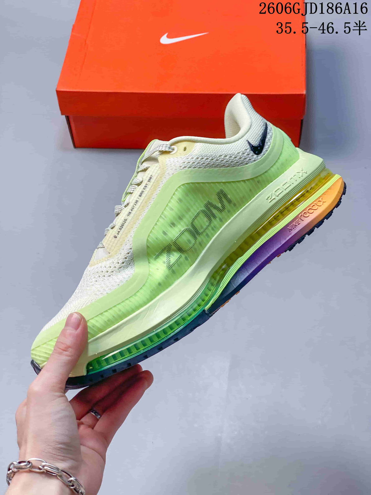 Side view of the Nike Pegasus Premium sneaker showing its green side panel and multicolor sole