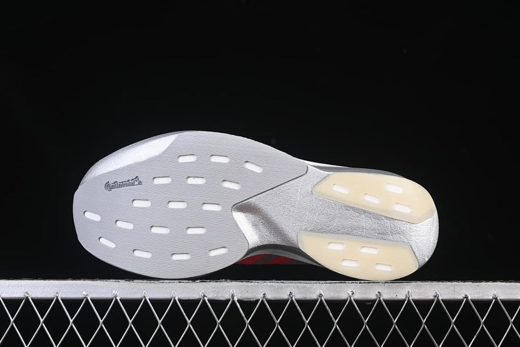 Outsole view with Continental lettering and segmented rubber sections
