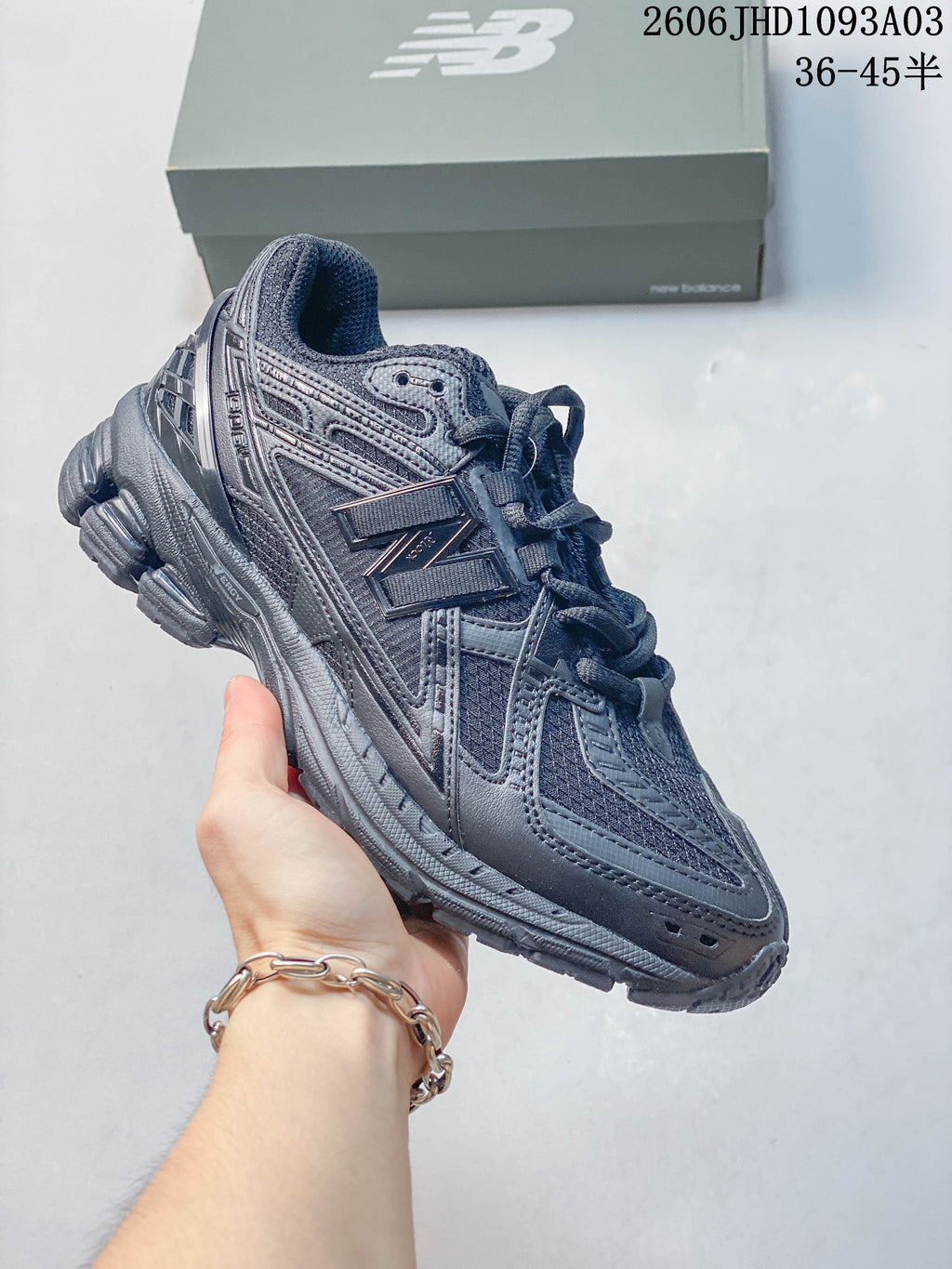Monochrome dark gray New Balance 1906U sneaker