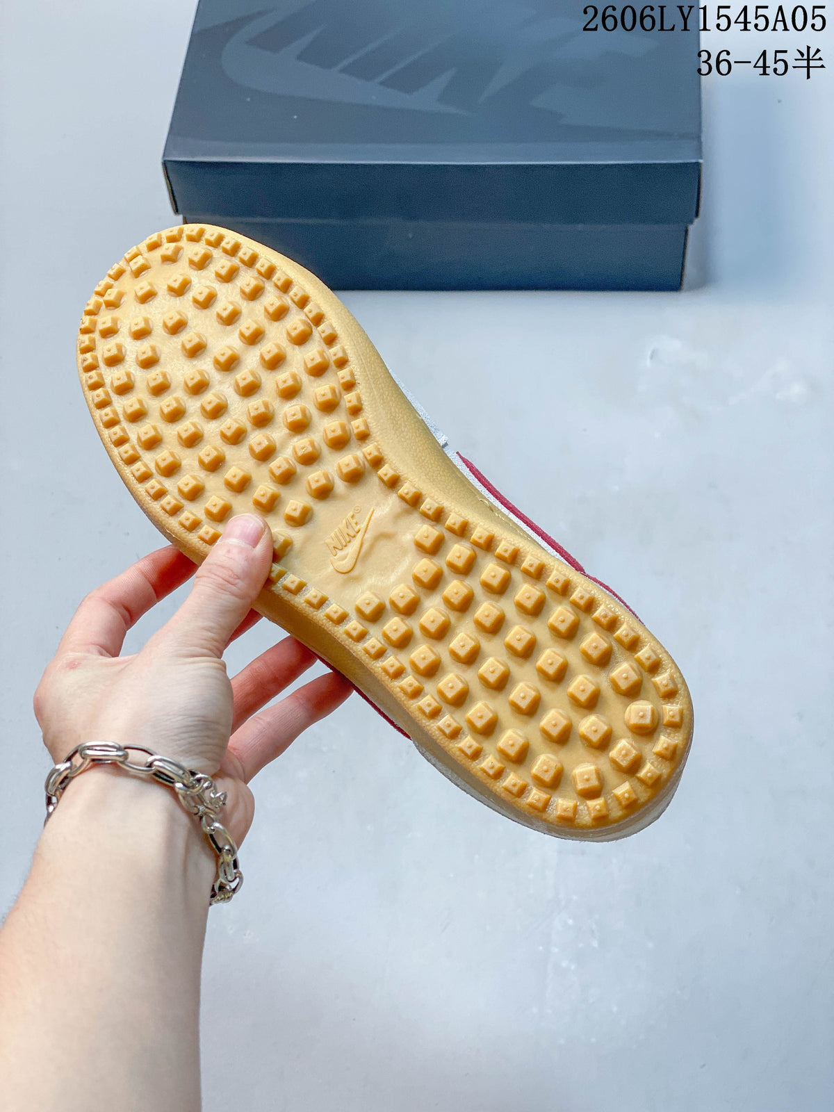 Close-up of the gum-colored outsole with raised tread