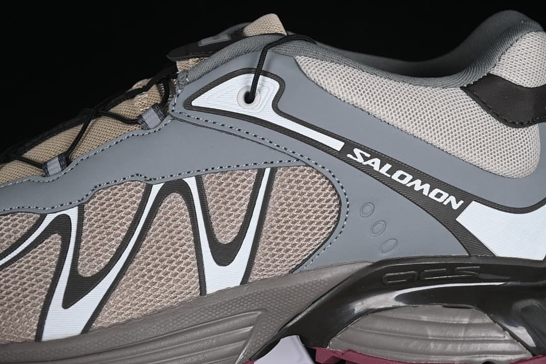 Close-up of the lateral side panels and Salomon branding.