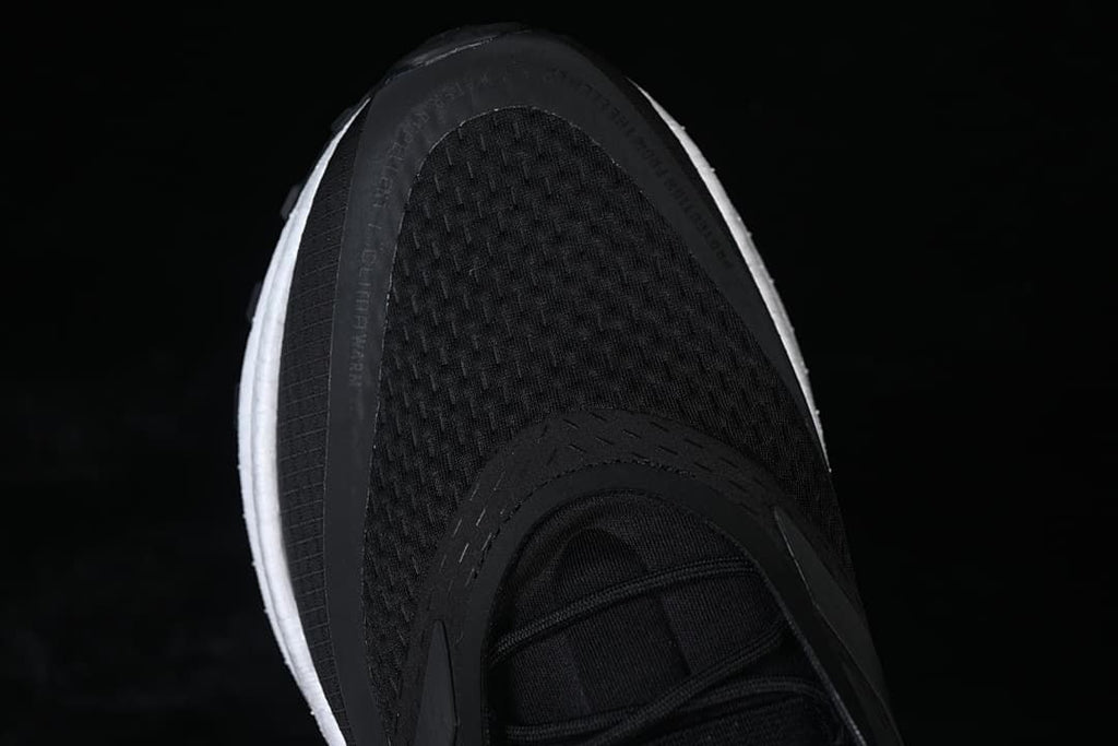Top view of the black mesh toe and lace area.