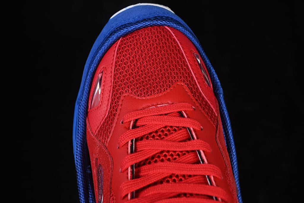 Top-down close-up of the mesh toe and lace area