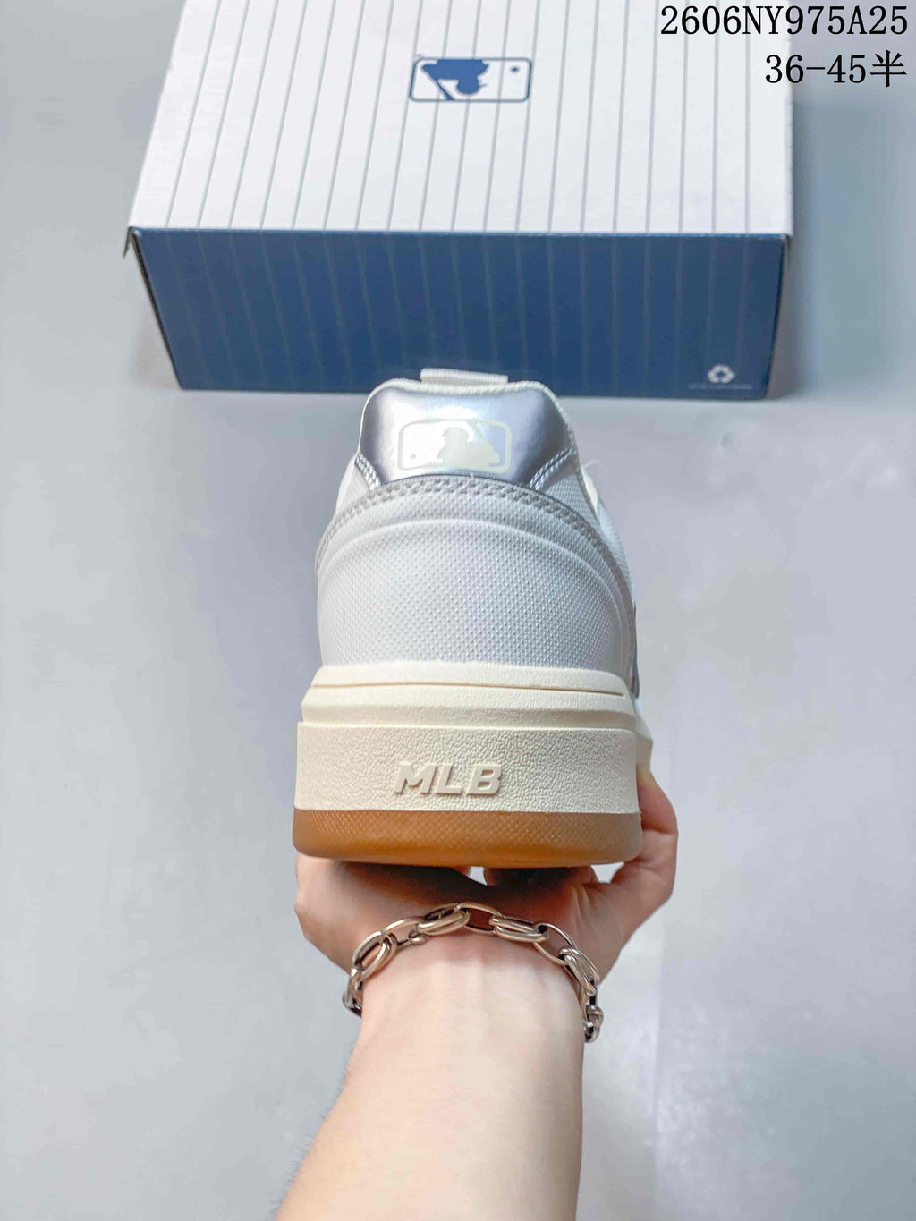 Rear view showing the raised off-white midsole and MLB heel detail.