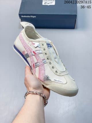 Onitsuka Tiger Mexico 66 sneaker in a light colorway with pink and blue side stripes, shown with its shoe box.