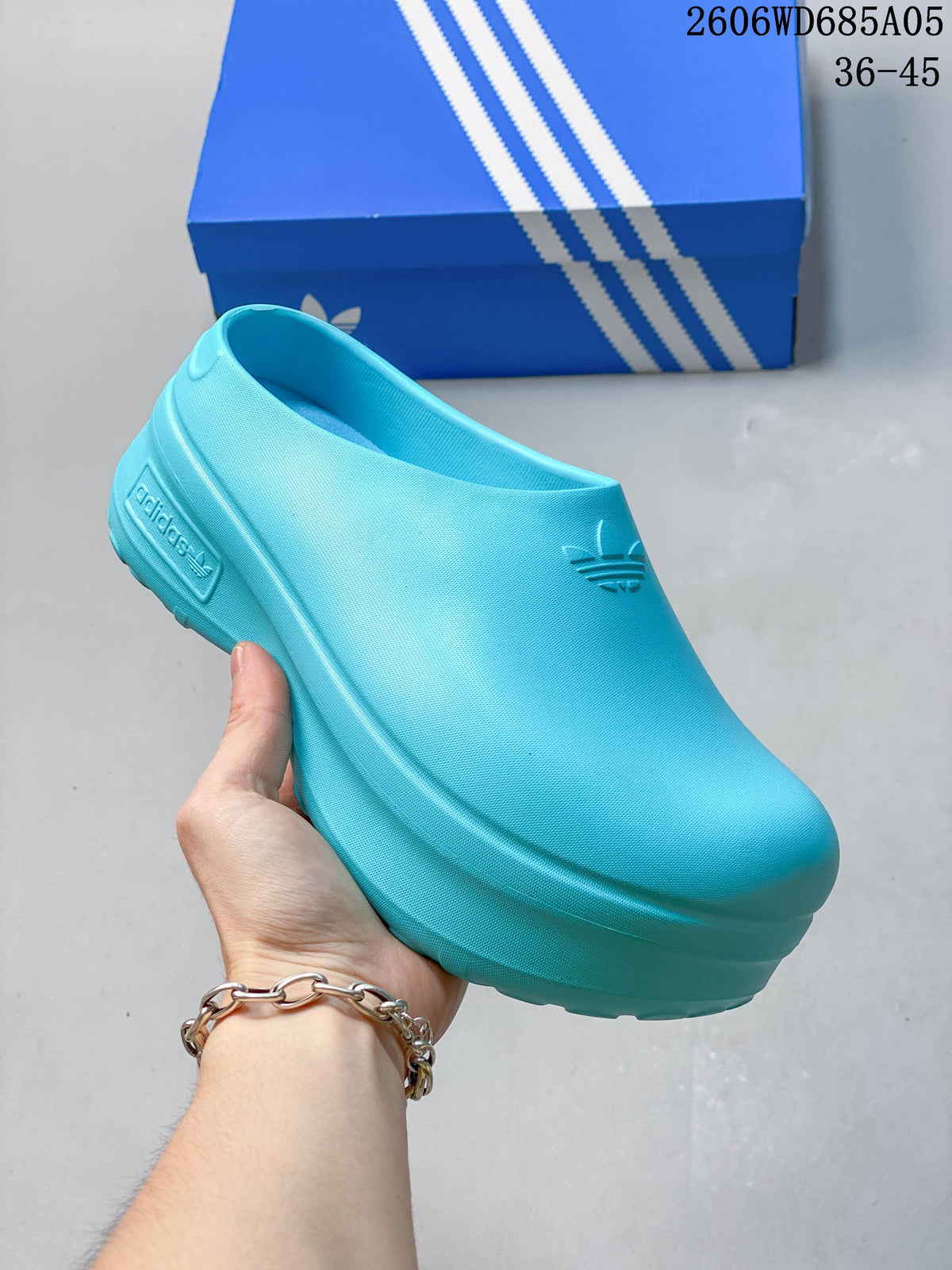 White Adidas mule clog with an open heel and closed toe