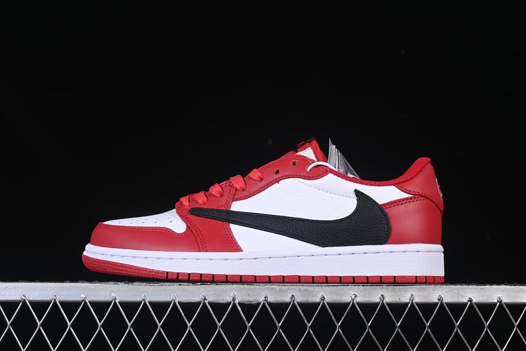 Side profile of the red, white and black sneaker.