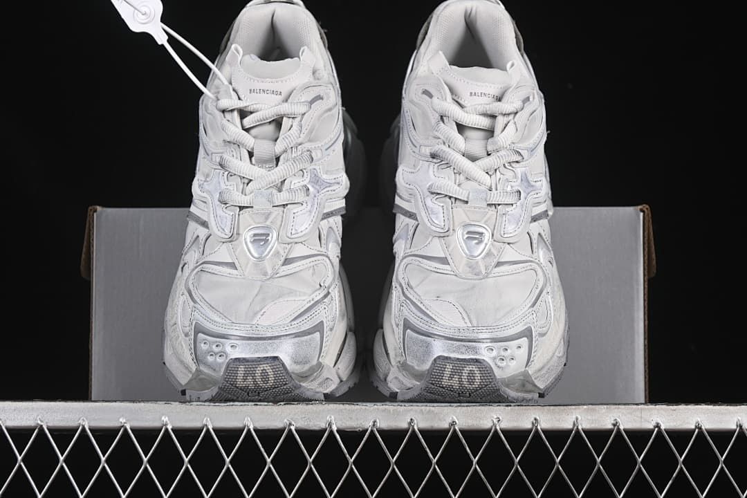 Front view of the pair showing the layered toe and lace-up design.