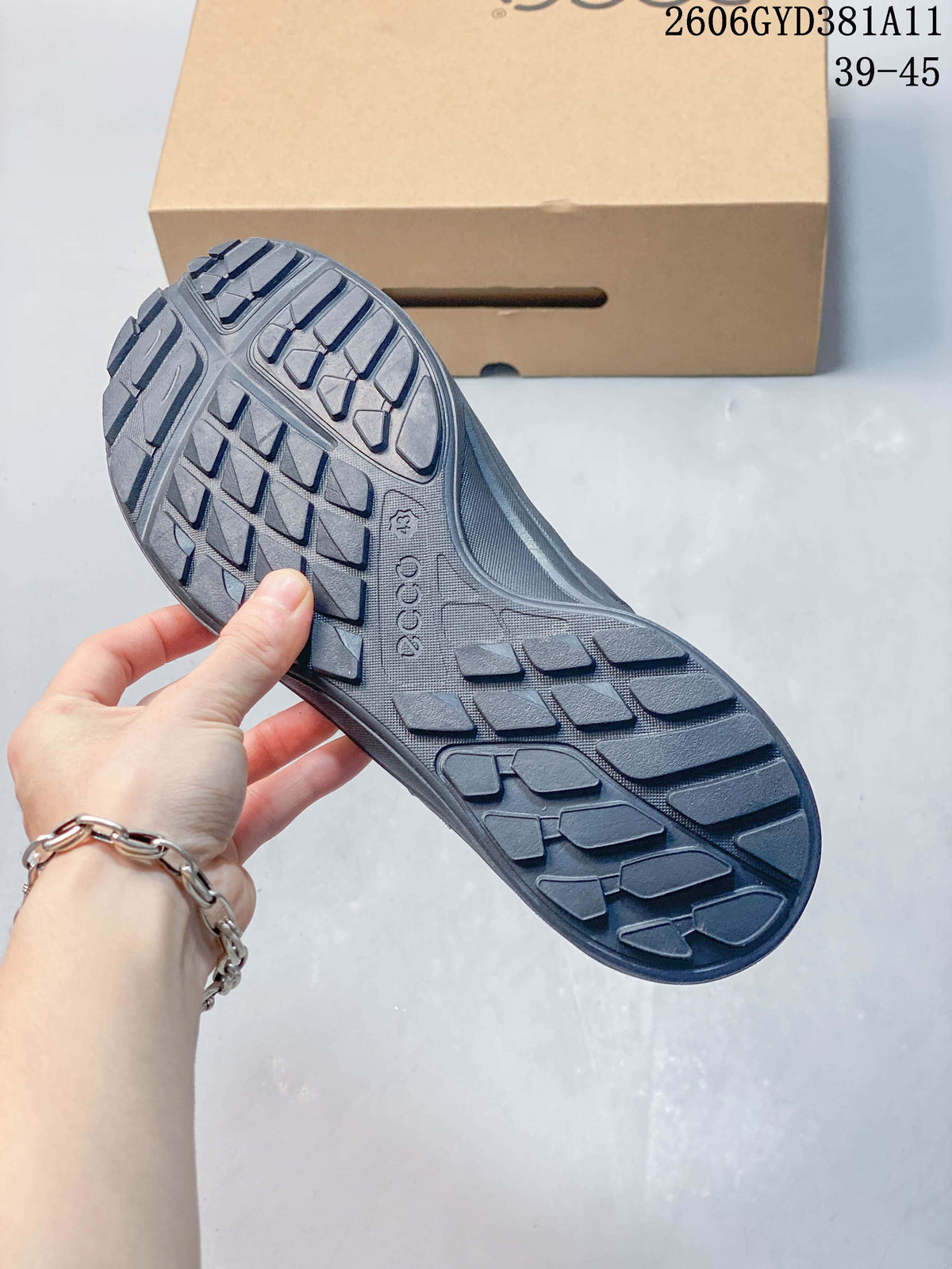 Close-up of the gray sneaker outsole with a patterned tread.