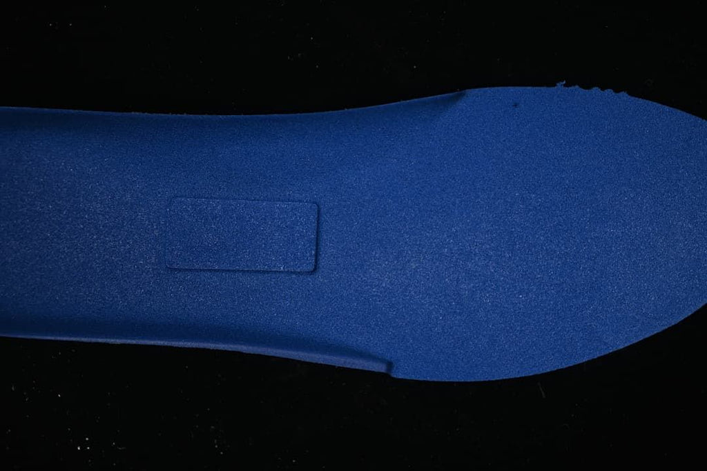 Blue shoe insole shown separately