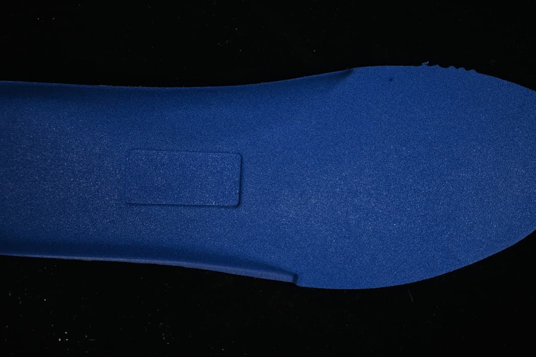 Blue shoe insole shown separately