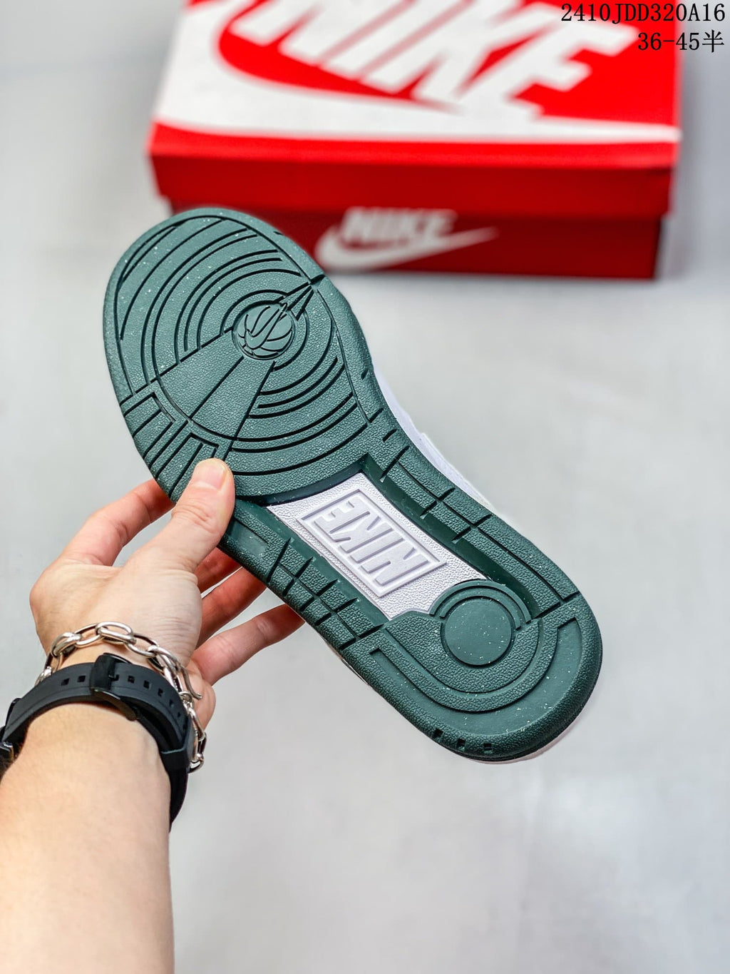 Close-up of the green outsole and molded tread on a Nike Full Force Low sneaker