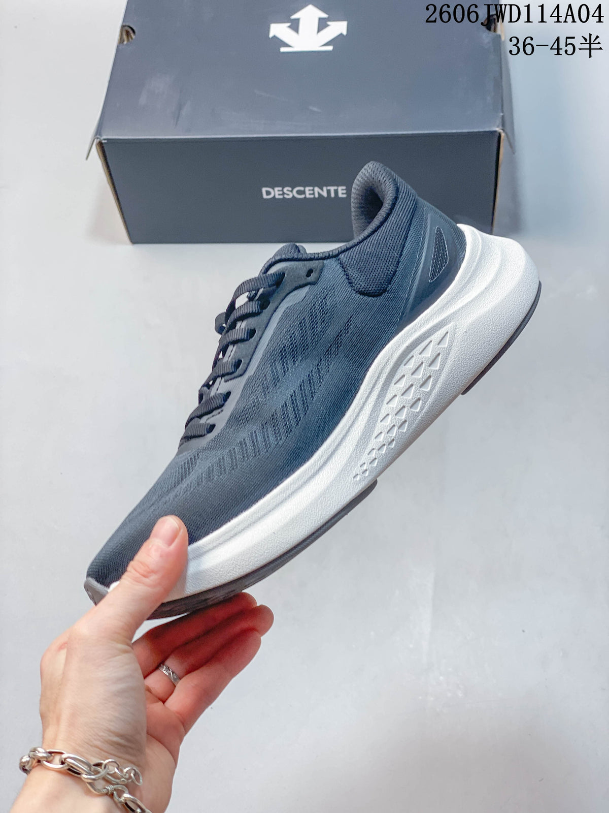 Side view of a blue-gray DESCENTE sneaker with a white midsole.