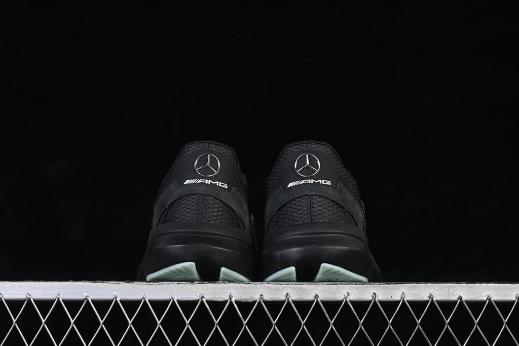 Rear view of the pair showing heel branding and outsole details