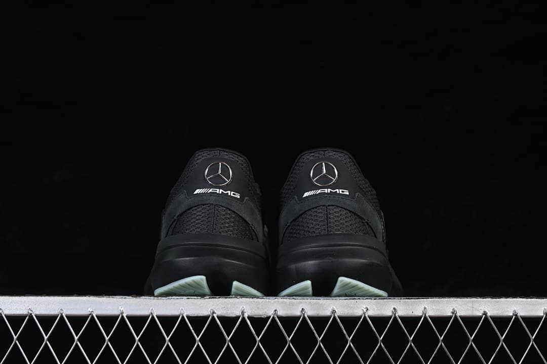 Rear view of the pair showing heel branding and outsole details