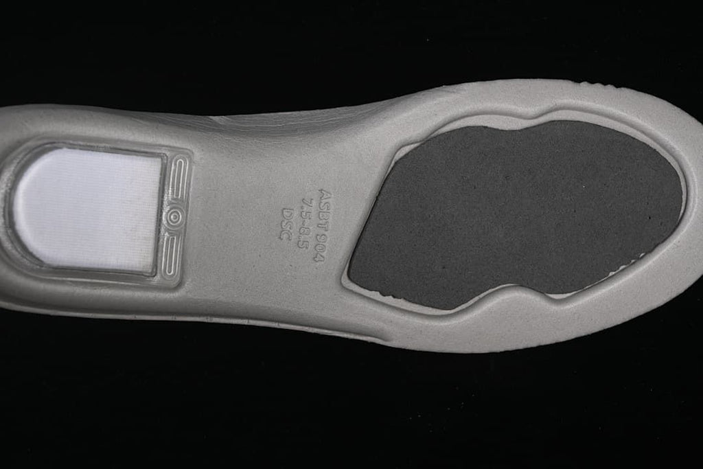 Underside of the insole showing molded markings