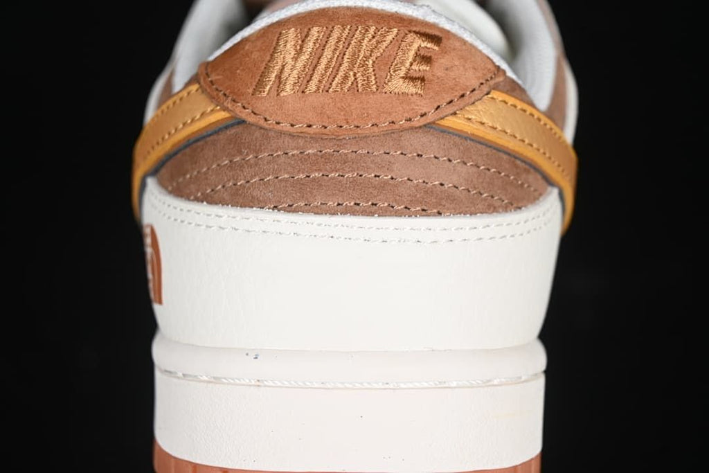 Rear close-up showing brown heel panels and contrasting branding