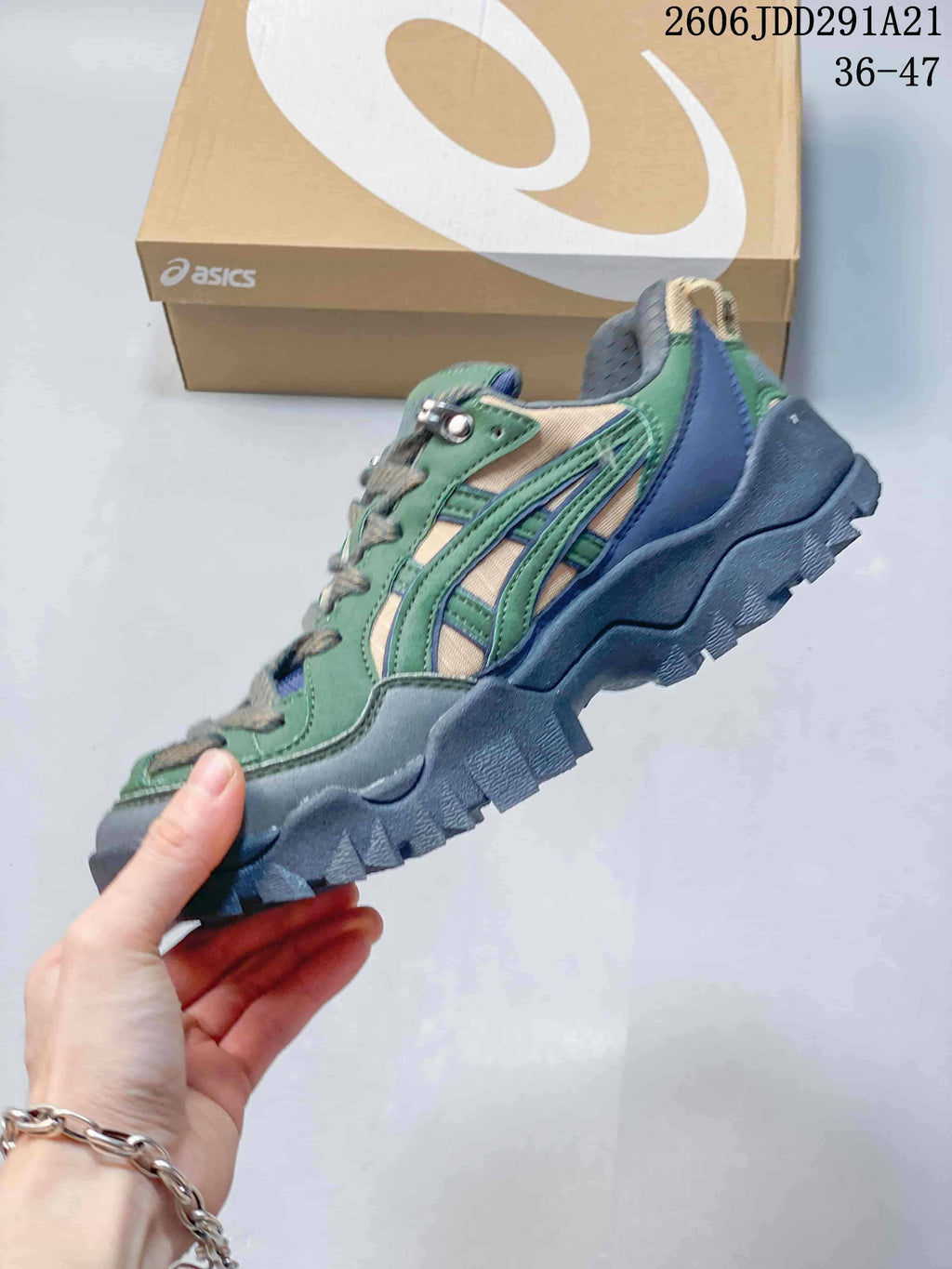 Side profile highlighting the layered upper and chunky outsole