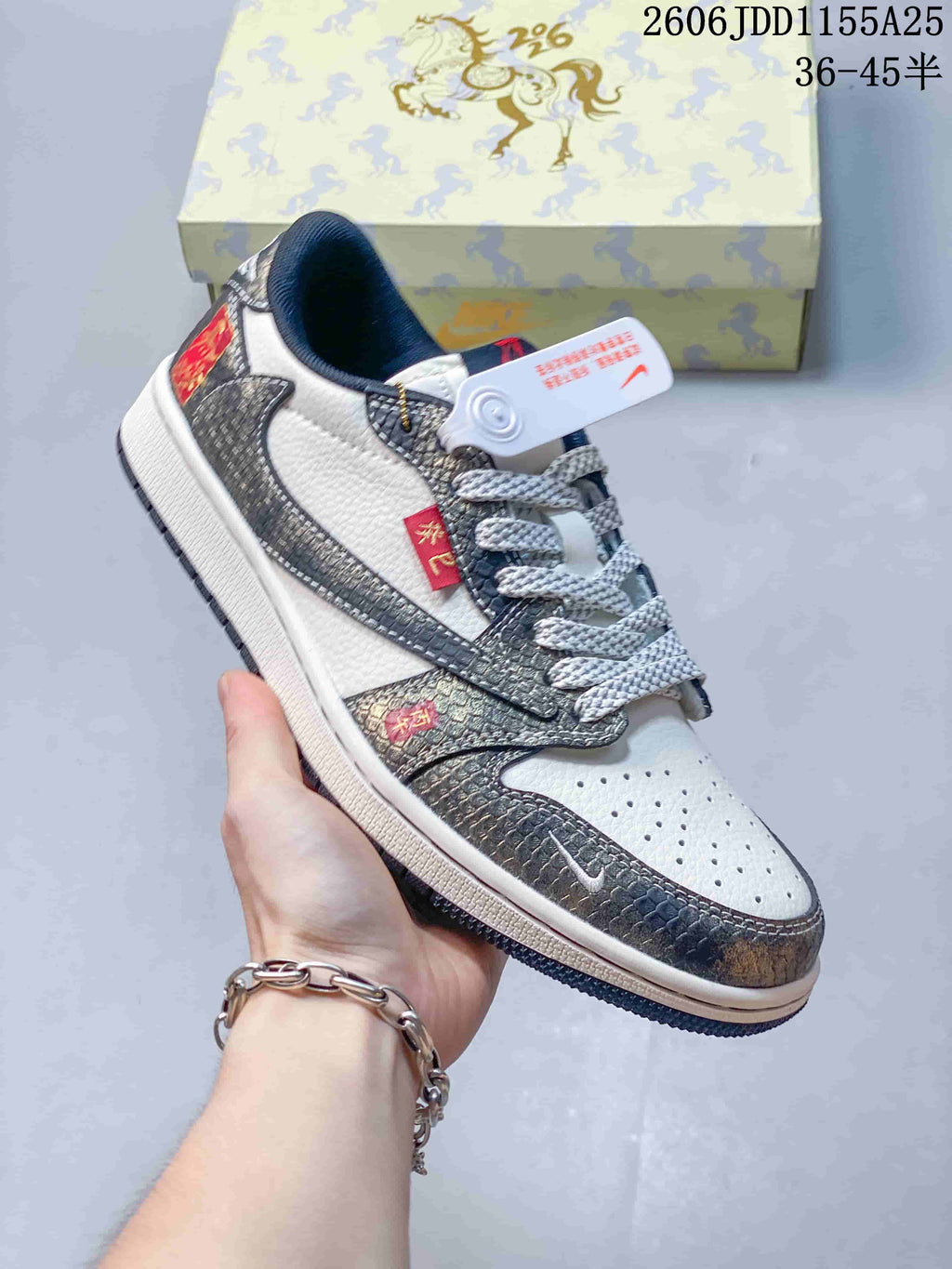 Angled side view of the sneaker with textured overlays and a white midsole