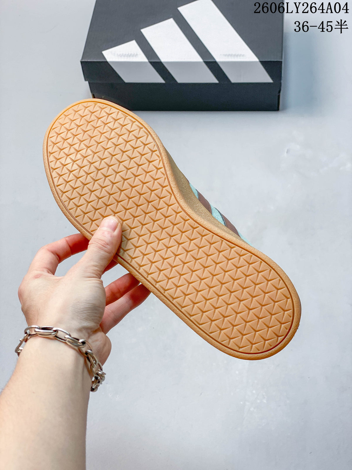Gum-colored outsole with geometric tread on the adidas VL Court Classic sneaker