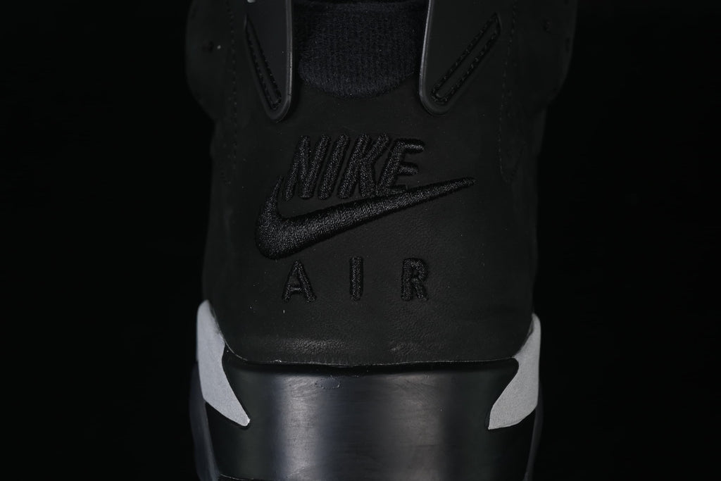 Close-up of the black embossed Nike Air heel logo.