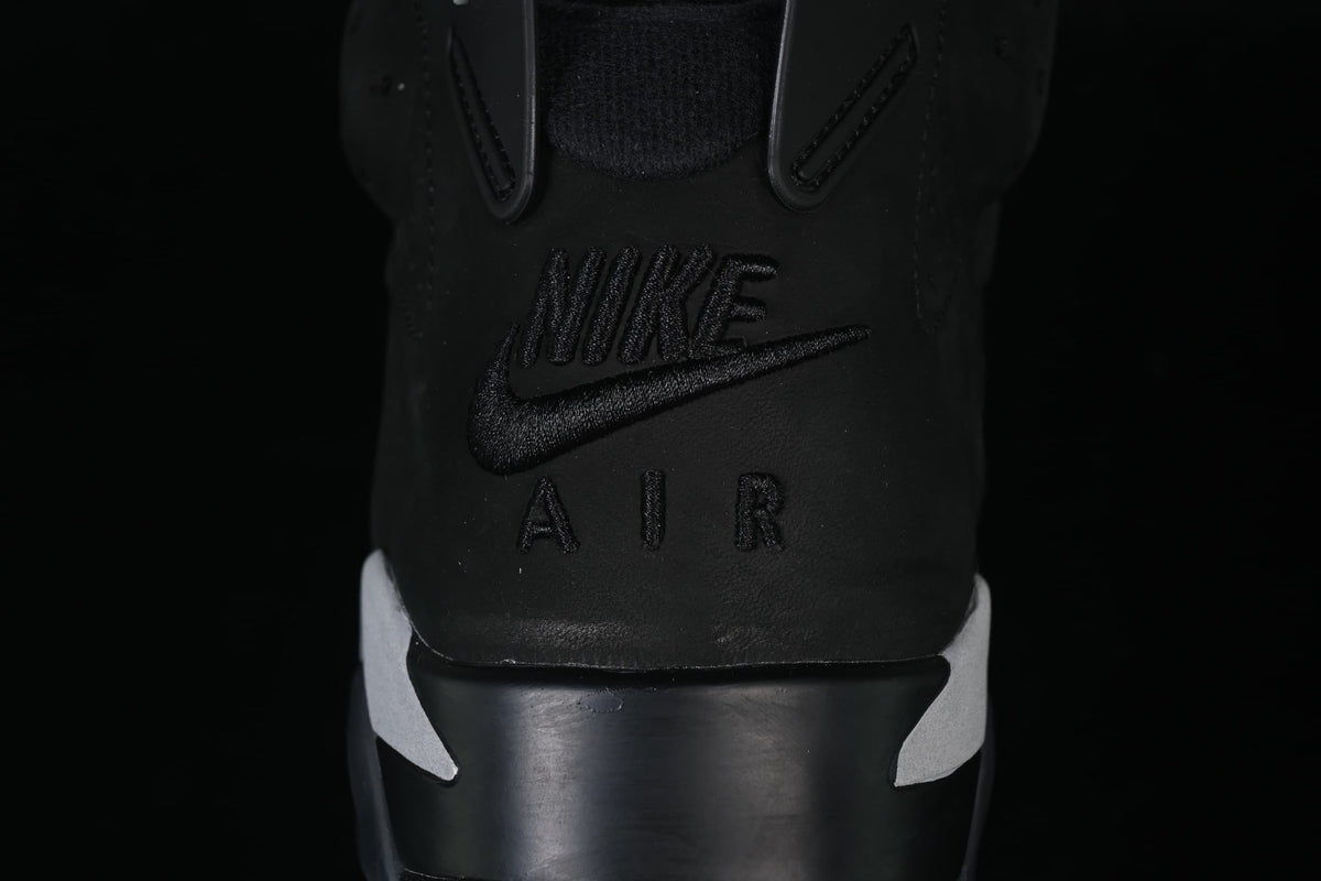 Close-up of the black embossed Nike Air heel logo.