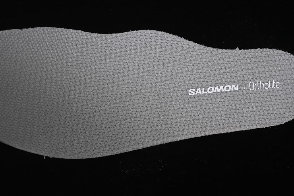 Close-up of the shoe insert marked Salomon and Ortholite.