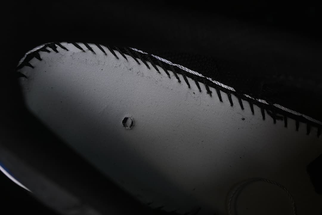 Close-up of stitching along the sneaker upper