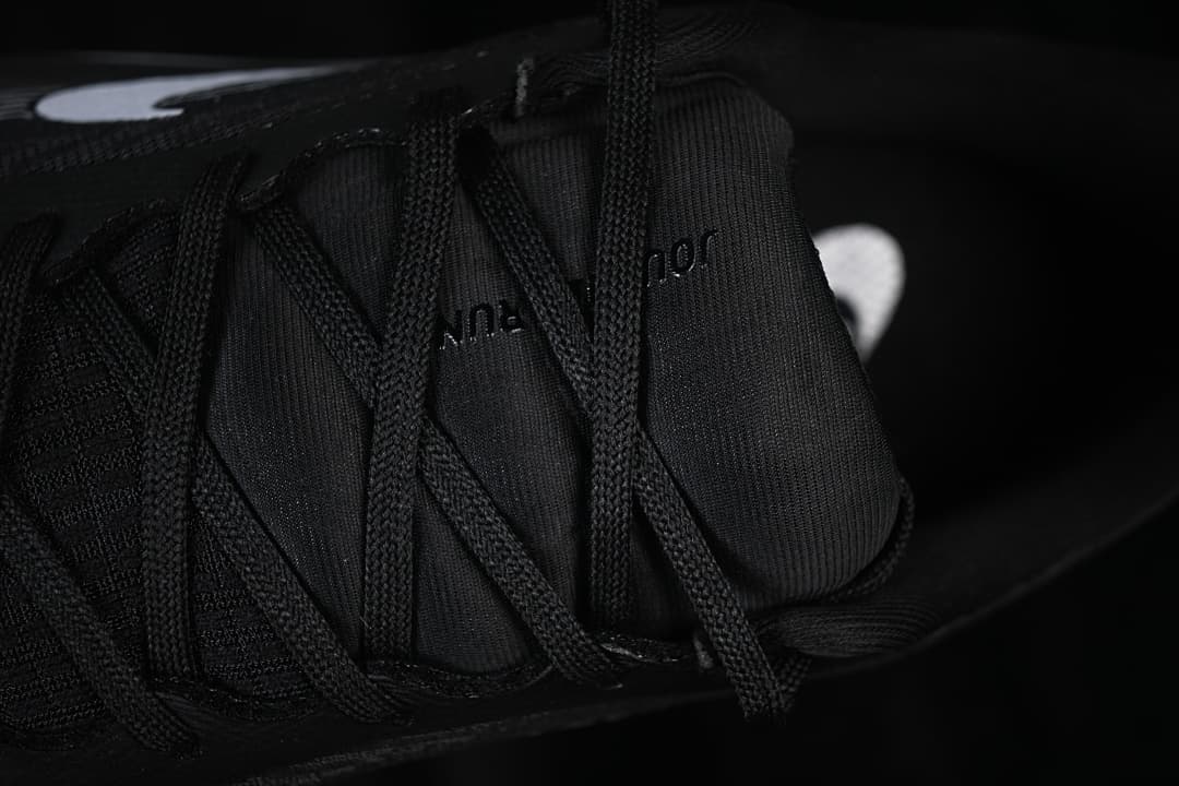 Close-up of black laces and tongue