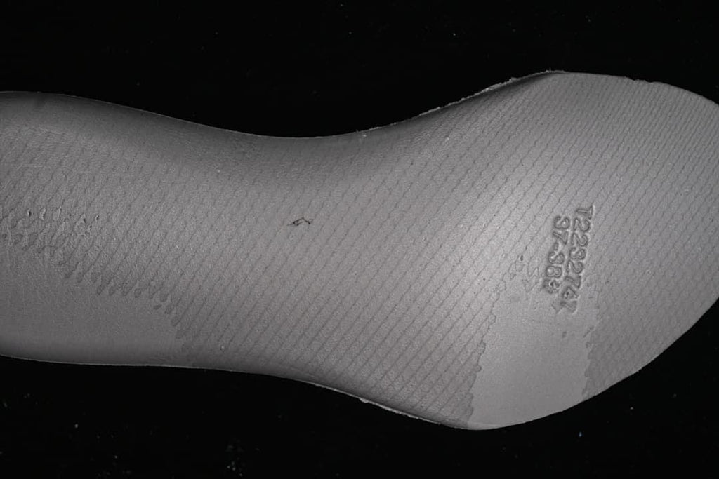 Close-up of the shoe insole with embossed size markings