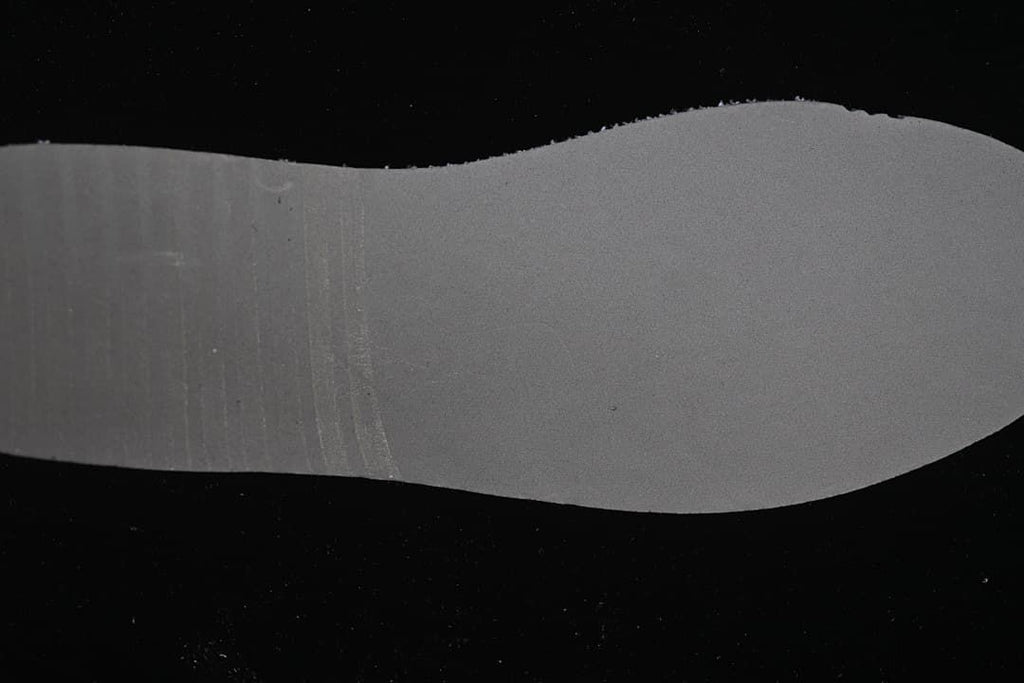 Close-up of the dark outsole surface