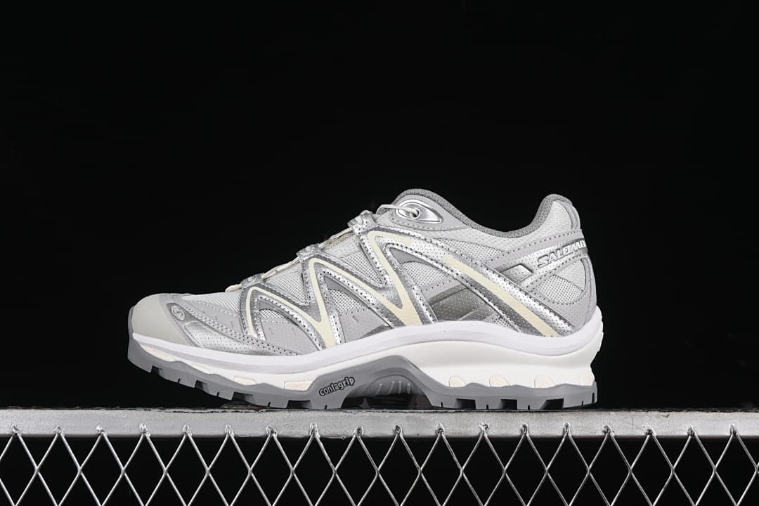 Side view of silver-gray Salomon XT-Quest GTX sneakers.