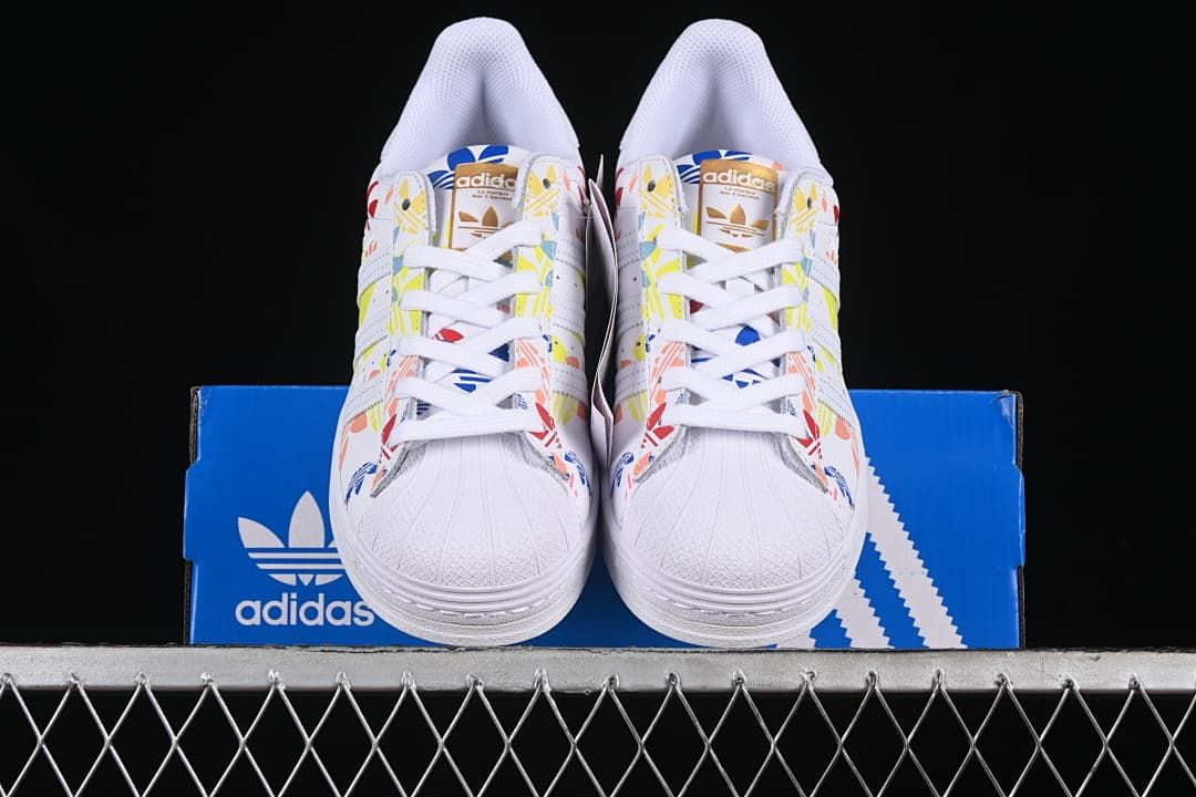 Front view of the pair showing shell toes and lace-up closure