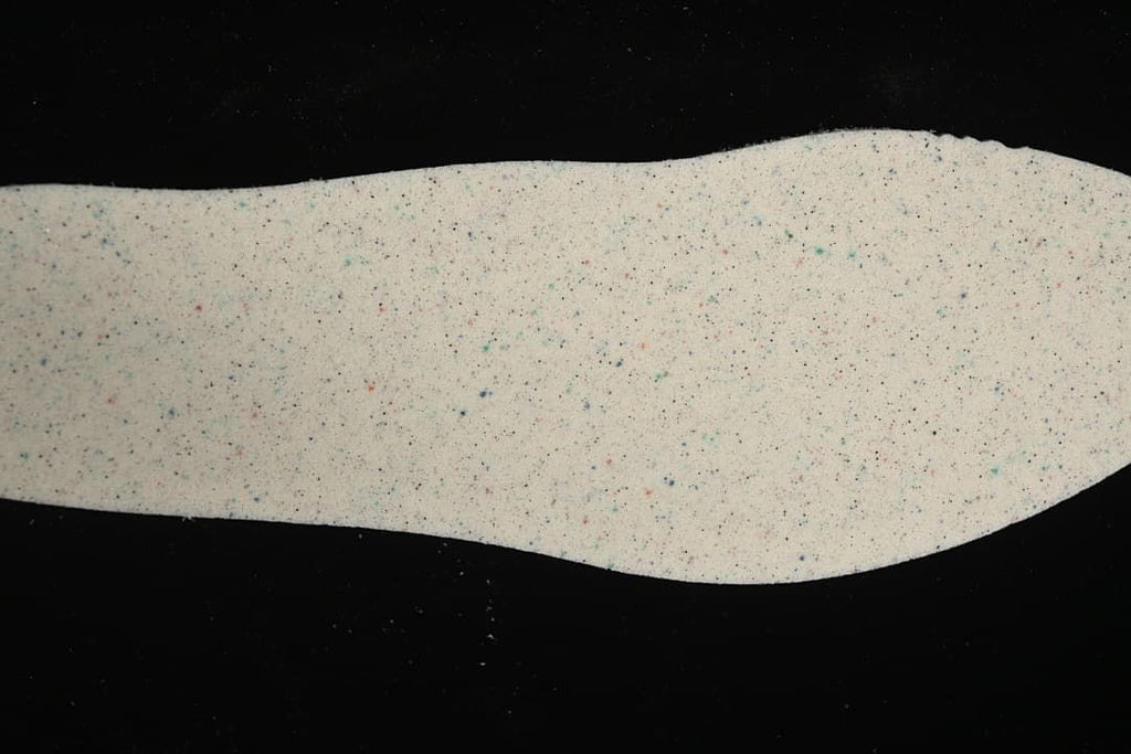 Close-up view of a light-colored shoe insole