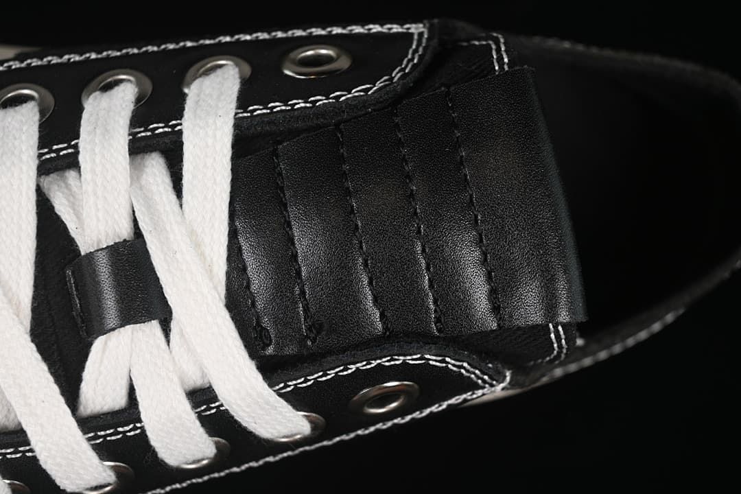 Close-up of the laces and stitched tongue detail.