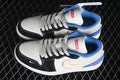 Pair of white, black, and blue Air Jordan 1 Low sneakers with patterned laces and visible Supreme tongue branding.