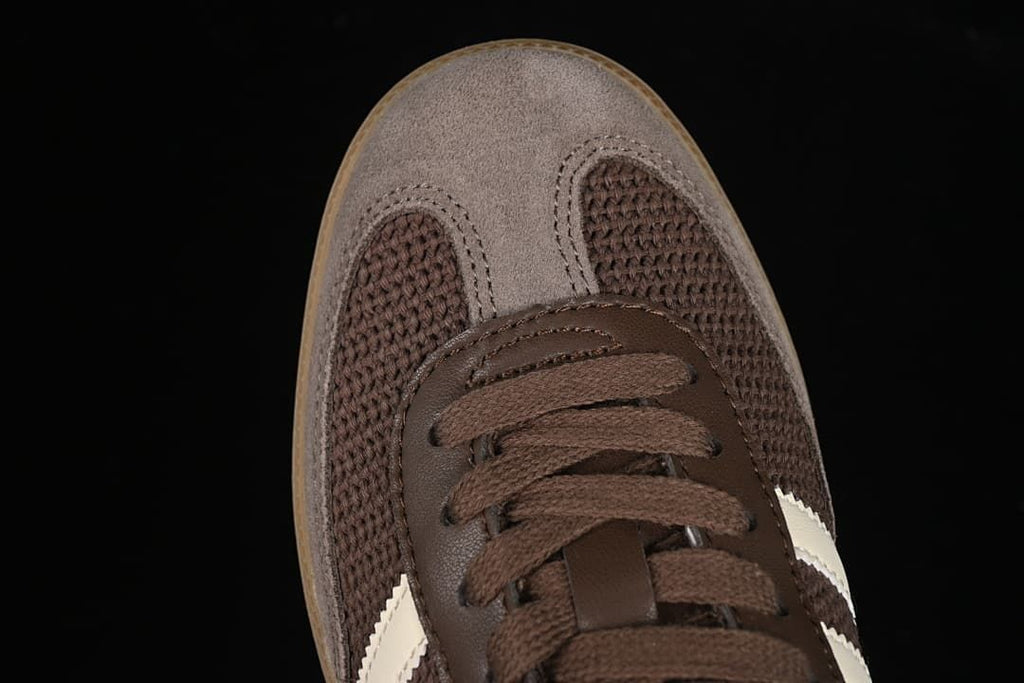 Top-down close-up of the toe and brown laces