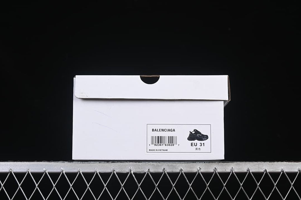 Shoebox label showing Balenciaga, EU 31, and black color text.