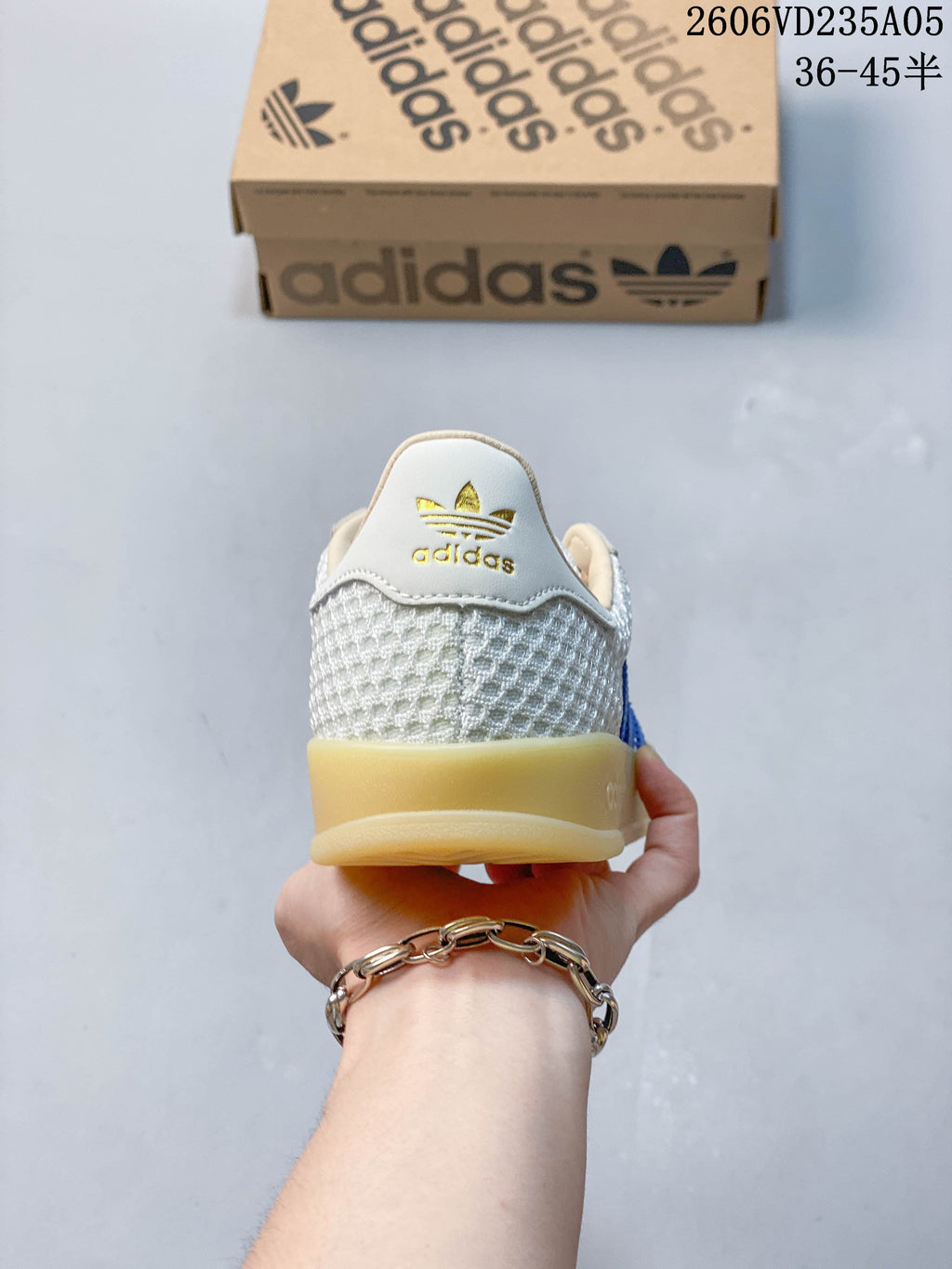 Rear view of a sneaker with textured heel panels and a gum-look sole