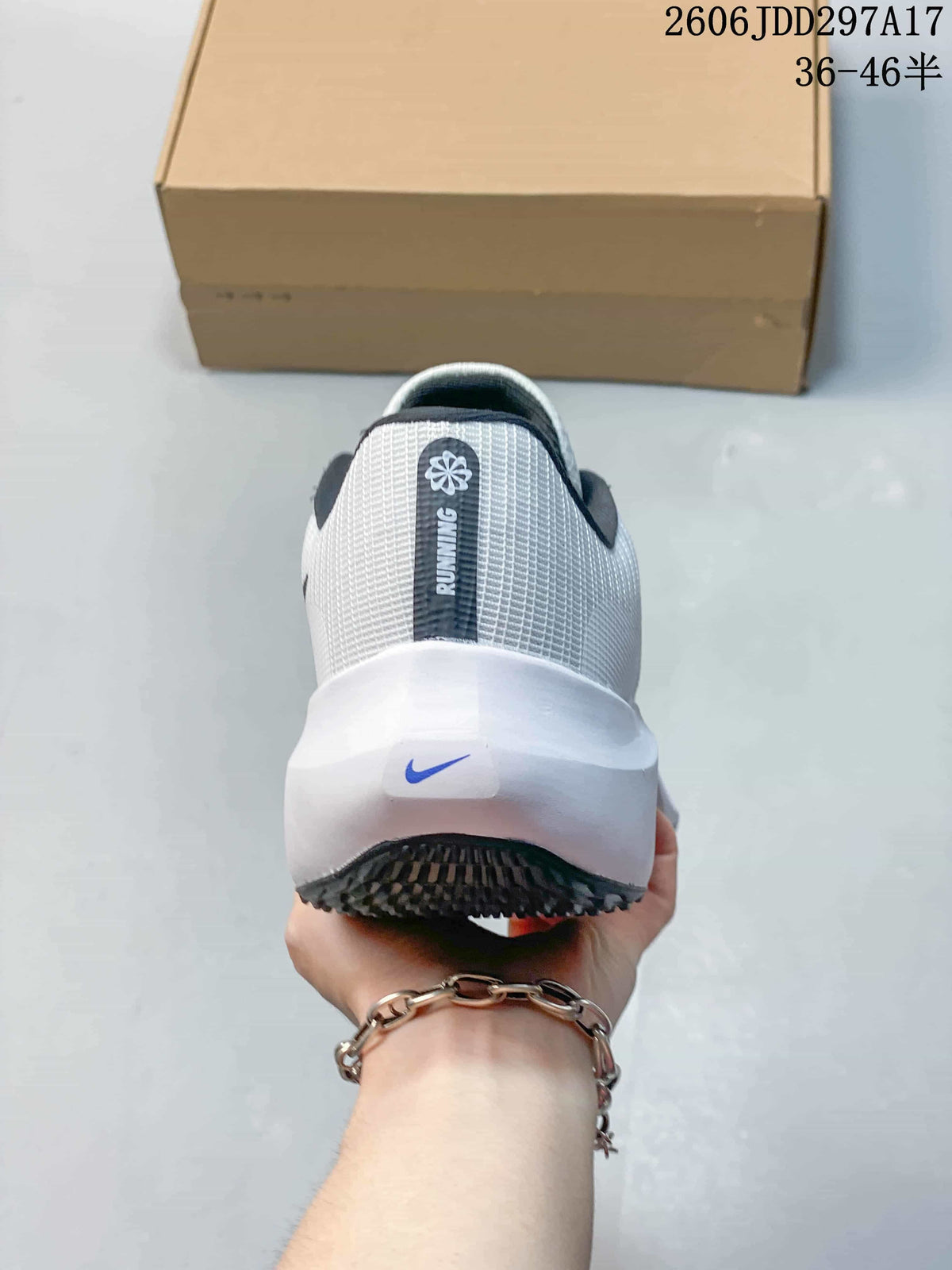Rear view of the Nike Zoom Fly 5 shoe with white midsole and dark heel lining.