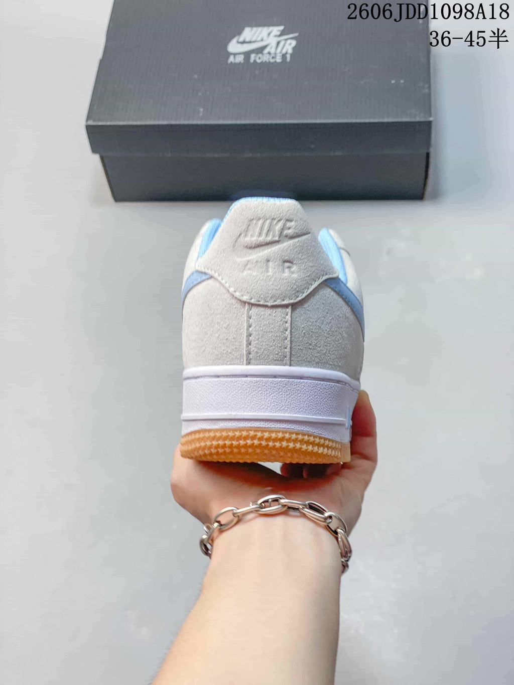 Rear view showing the heel and gum-colored outsole