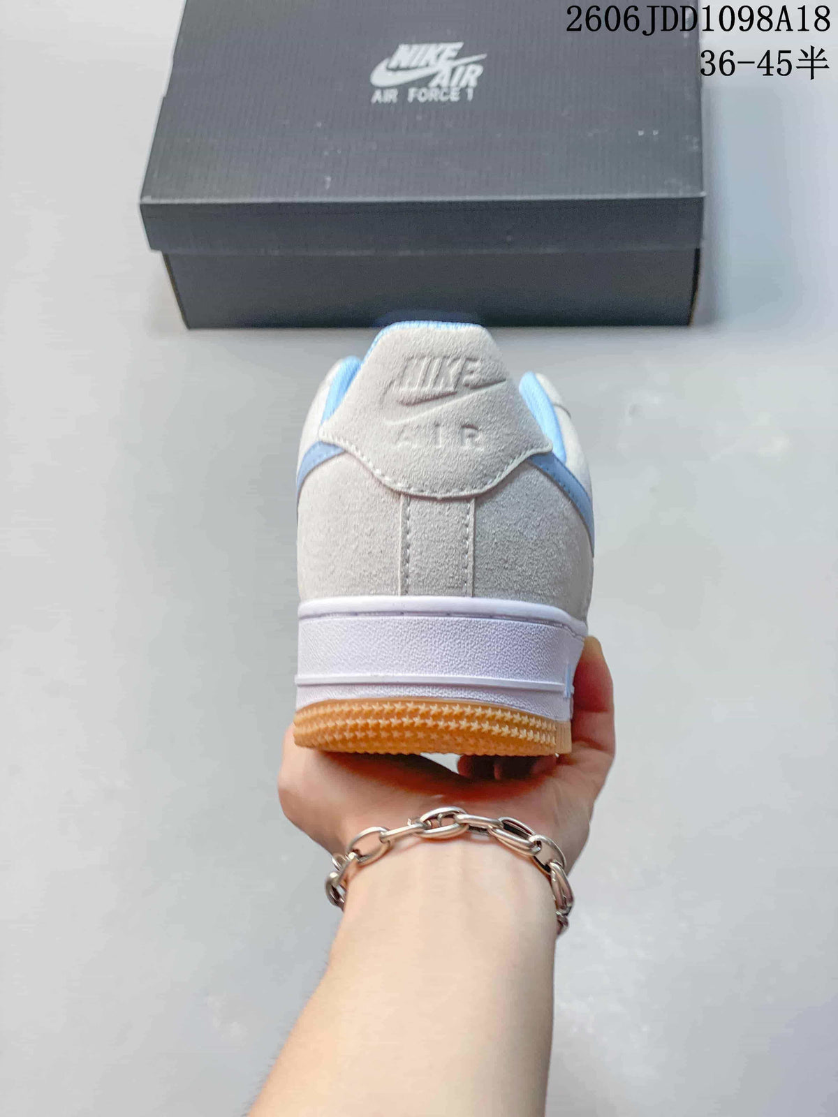 Rear view showing the heel and gum-colored outsole