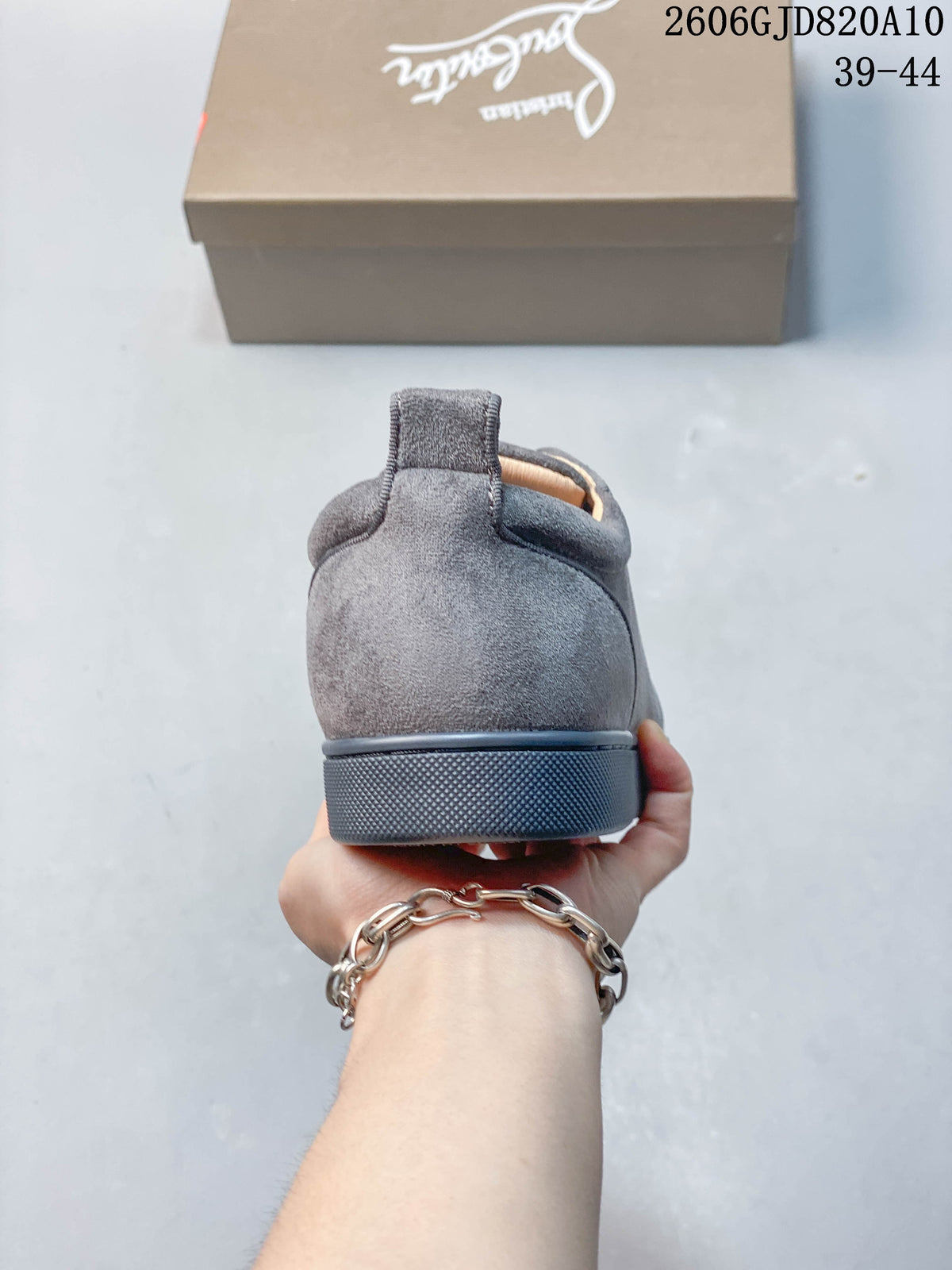 Rear view of a grey sneaker showing the heel and sole