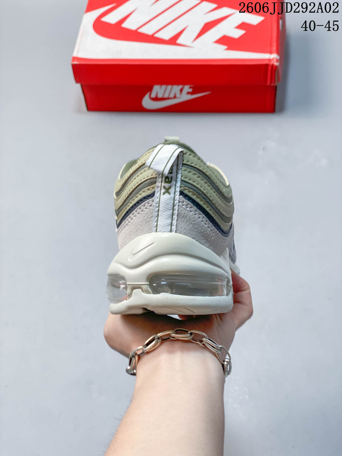 Rear view of a Nike Air Max 97 sneaker showing the heel and visible Air unit
