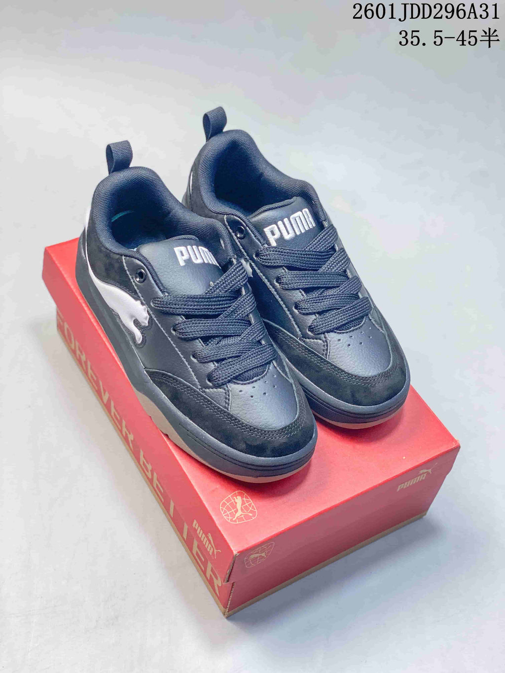 PUMA 180 sneakers in dark navy and black with a white side detail