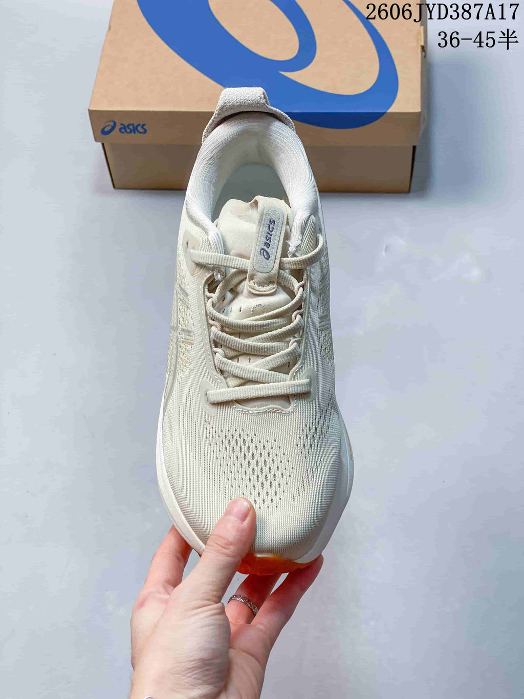 Top view of the shoe showing its laces, tongue, and perforated-looking forefoot