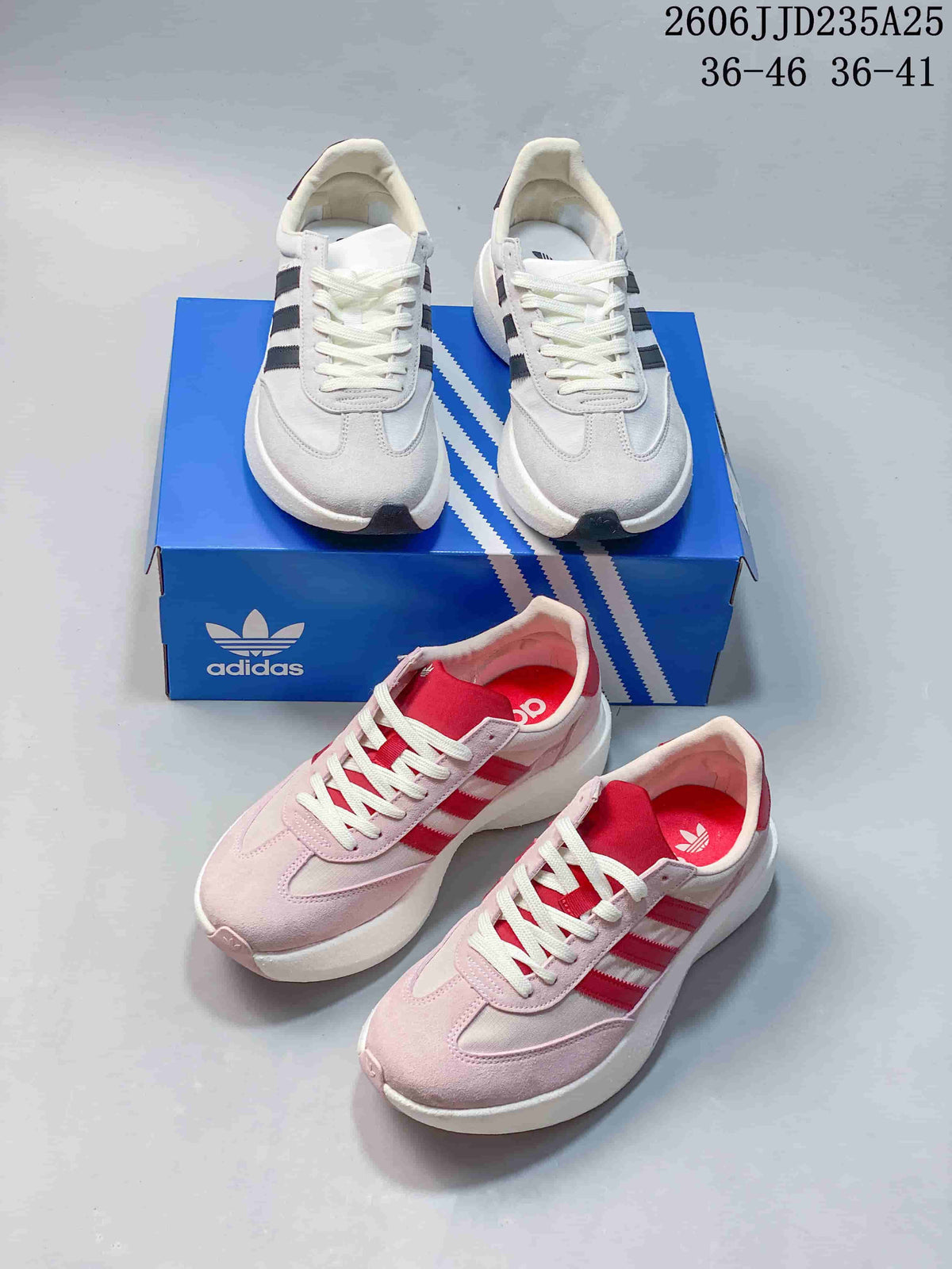 Light neutral and pink Adidas Adizero SL 72 Pro sneakers displayed together