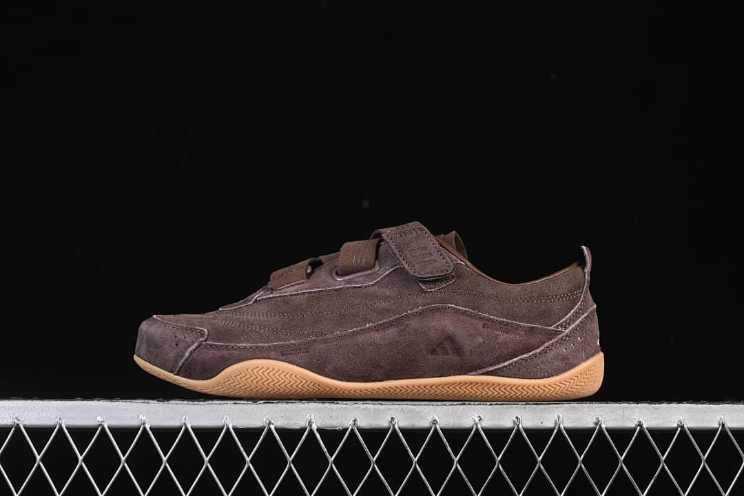 Side view of a brown adidas Urban Reverie sneaker with hook-and-loop straps and a gum-colored outsole.