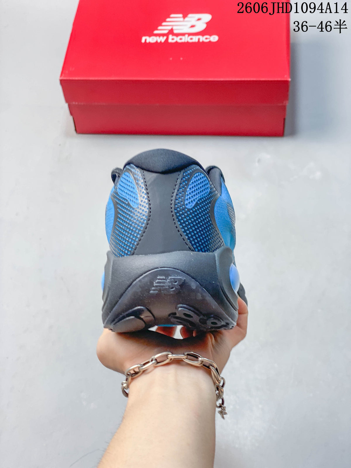Rear view of the blue and gray shoe with padded heel collar
